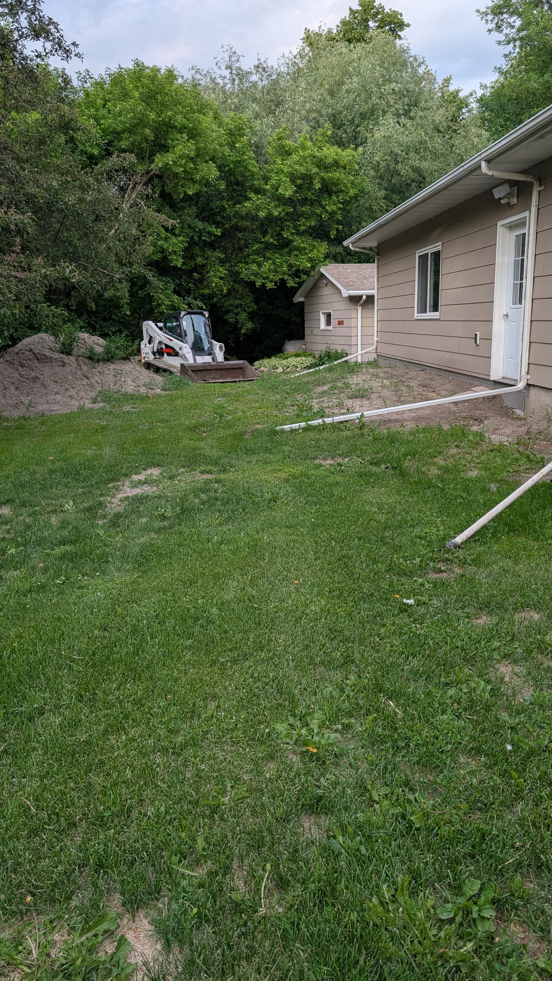 Yard Regrade and Drainage Fix in Grafton, ND